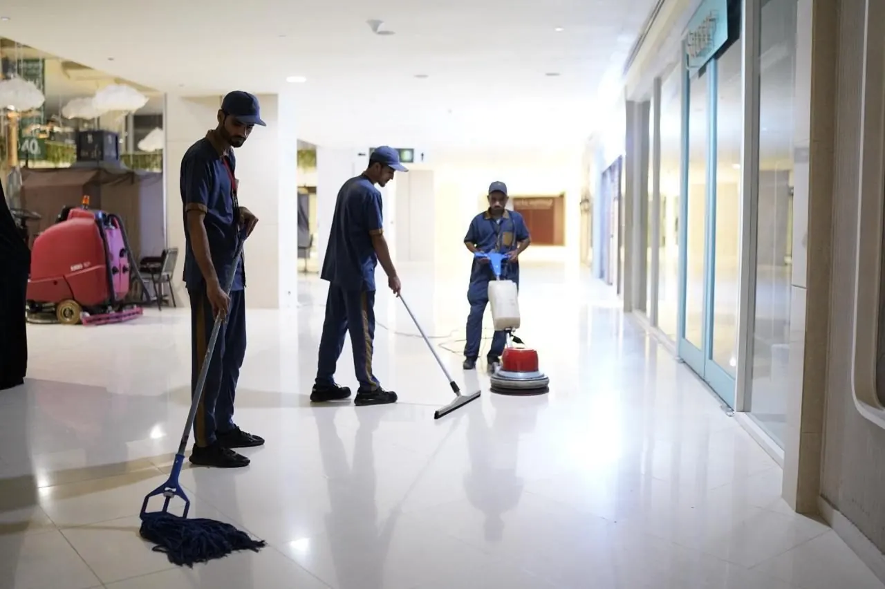 Feroza janitorial team mopping and polishing a mall concourse